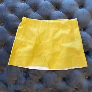Yellow leather mini skirt